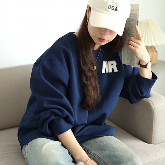 大きいサイズ レディース サガラ刺繍ロゴワッペンボリューム袖ニット